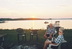 Guests watching the sunset over Wabana Lake