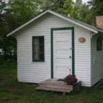 Exterior of Cabin 5 with green trim