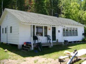 Exterior of Cabin 7 with a covered porch