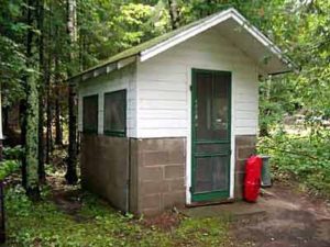 Fish house beside the trees