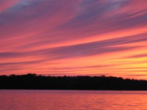 Pink and orange sunset over Wabana Lake