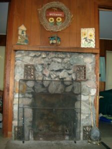 Stone fireplace inside the lodge
