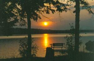 Sunset over Wabana Lake with a dock in the foreground
