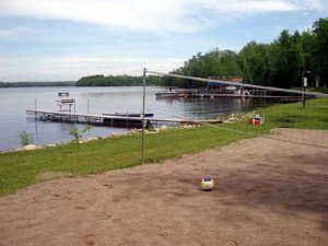 Sand volleyball court beside the dock