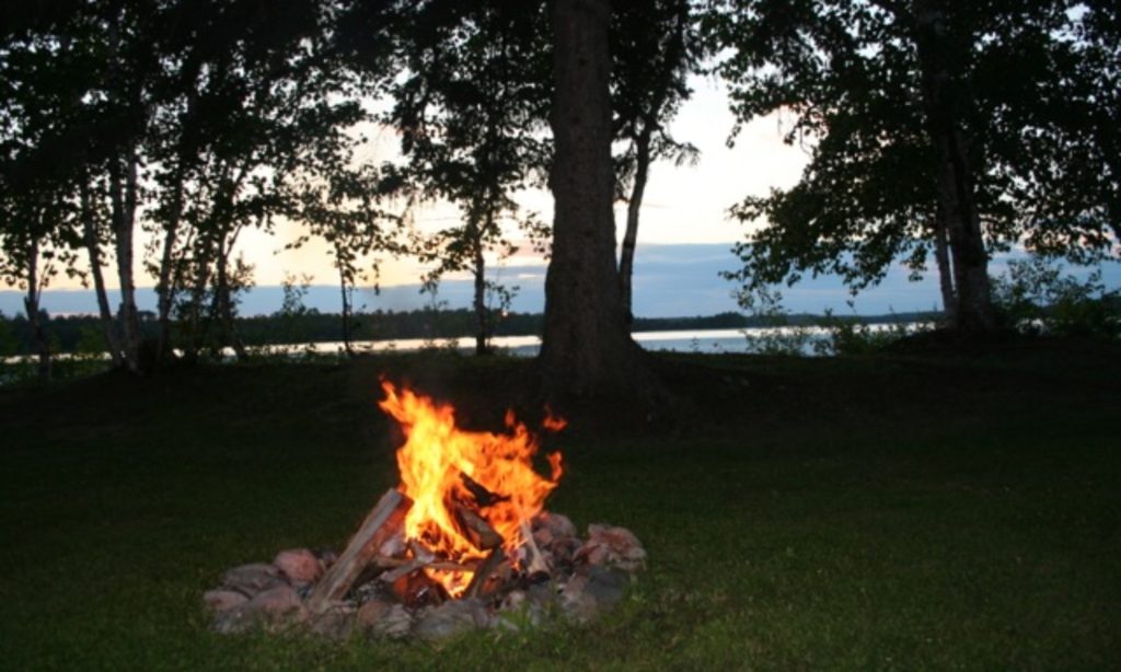 Evening campfire overlooking Wabana Lake