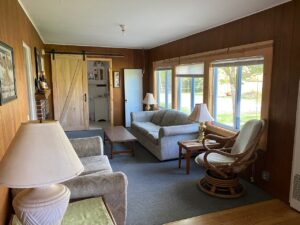 Cabin 7 living room with chairs and lake views