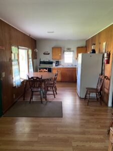 Cabin 7 open-plan living and dining room